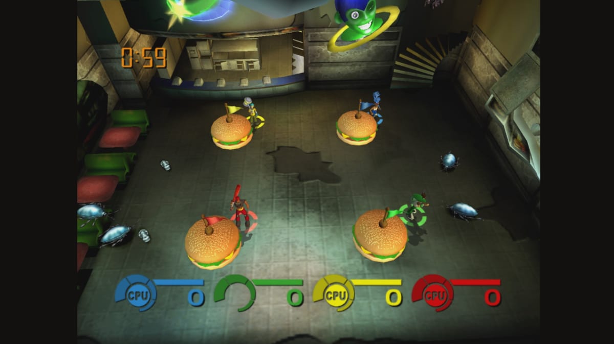 Top-down original Xbox arena with four color-coded players, a countdown timer, and score meters