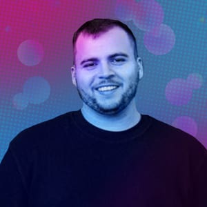Headshot of Waylon Fisher, COO of Clique Games, in a black sweatshirt